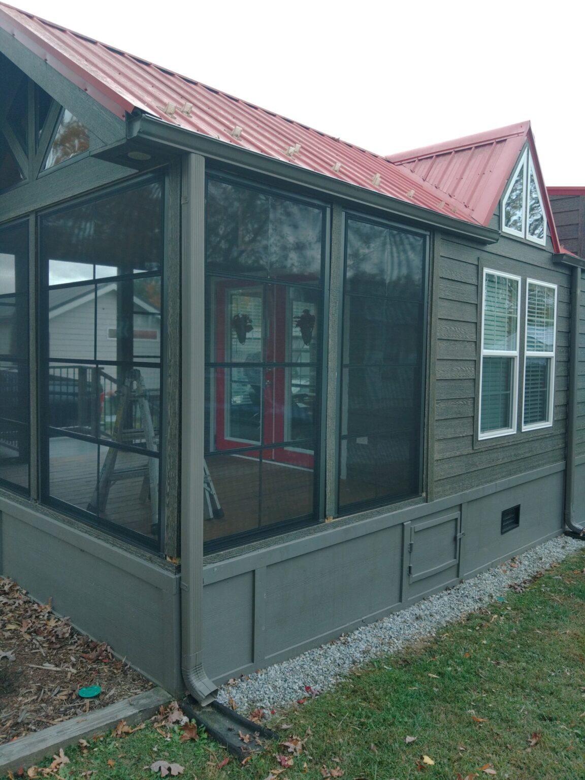 three-season room with red roof in spartanburg, sc
